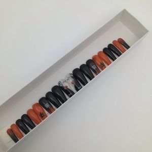 Long Halloween Inspired Orange and Black Gel Nails